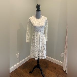 Cream lace dress, long sleeves, knee length. Size M